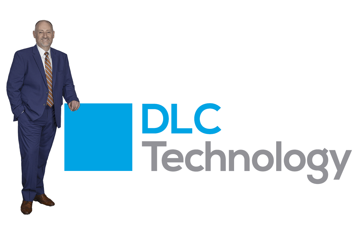 Darren leaning on huge logo